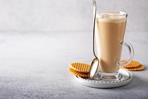 Vanilla coffee latte in a tall glass photo