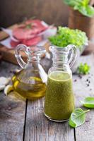 Aromatic olive oil with basil photo