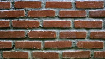 Natural close up red brick wall for wallpaper and background. photo