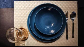 Dinning table set at home, tableware, glasses, spoon and fork. photo