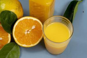 Natural orange juice in the glass photo