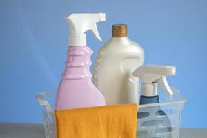 basket with cleaning products for home hygiene use photo
