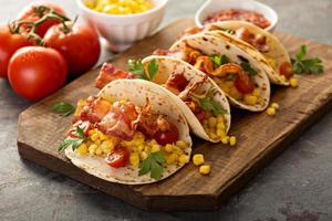 Breakfast tacos with scrambled eggs and bacon photo