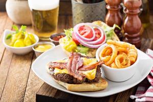 Traditional american burger with cheese and bacon photo