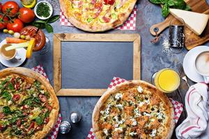 Breakfast gourmet pizzas on the table photo