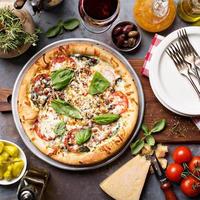 Margherita pizza with basil photo