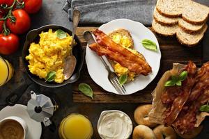 Big breakfast with bacon and scrambled eggs photo