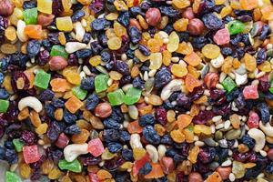 Mixed nuts and fruits in a bowl photo