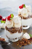 Banana and granola breakfast parfait photo