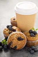 Vegan banana blueberry muffins with coffee to go photo