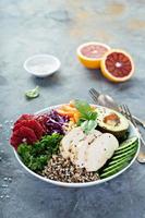 Healthy lunch bowl with chicken and quinoa photo