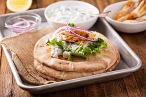 Chicken pita sandwich with cucumber sauce photo