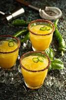 Spicy mango margaritas with hot pepper photo