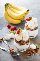 Banana and granola breakfast parfait photo