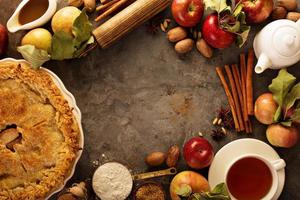Apple pie decorated with fall leaves photo