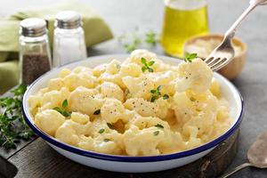 Cauliflower with cheese sauce photo