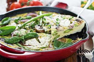 Asparagus, mushrooms and goat cheese frittata photo