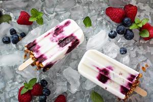 Yogurt, berry and granola breakfast popsicles photo