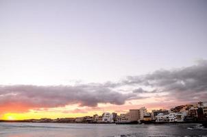 Sunset over the ocean photo