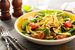 Mexican salad with corn and avocado photo