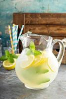 Traditional lemonade in a pitcher photo