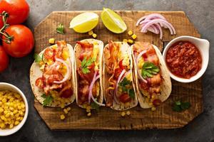 Breakfast tacos with scrambled eggs and bacon photo