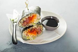 Sushi or poke burrito with nori photo