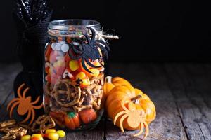 Halloween candy and snacks in a jar photo