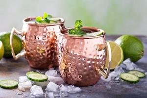Moscow mule cocktail with lime and cucumber photo