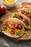 Breakfast tacos with scrambled eggs and bacon photo