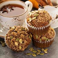 Healthy pumpkin muffins with tea and spices photo