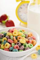 Fruit colorful sweet cereals in a bowl photo