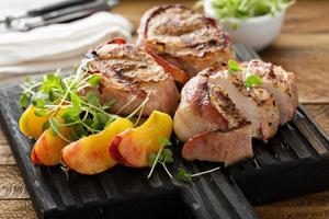 Grilled turkey tenderloins with bacon photo