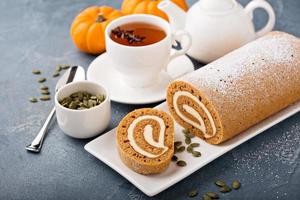 Fall dessert pumpkin roll with cream cheese photo