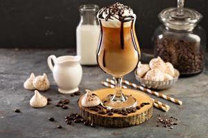 Iced coffee with whipped cream photo