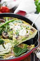 Asparagus, mushrooms and goat cheese frittata photo