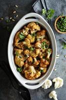 Roasted cauliflower with pine nuts and parsley photo