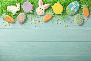 Easter cookies on blue table photo