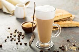 Hot coffee latte with biscotti cookies photo