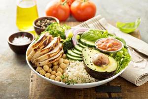 Healthy lunch bowl with grilled chicken photo