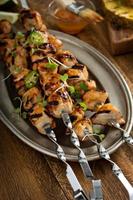 Chicken kabobs with sweet and sour sauce photo