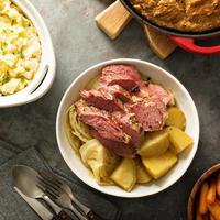 Traditional Irish dinner with corned beef and colcannon photo