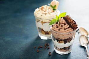 Individual desserts in glasses photo