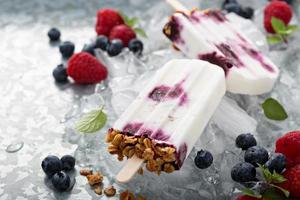 Yogurt, berry and granola breakfast popsicles photo