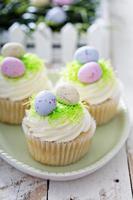 Easter vanilla cupcakes with cream cheese frosting photo