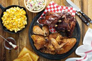 Grilled or smoked ribs and chicken photo