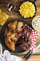 Grilled or smoked ribs and chicken photo