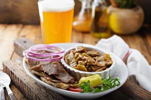 Gyro plate with meat on a pita photo