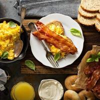 Big breakfast with bacon and scrambled eggs photo