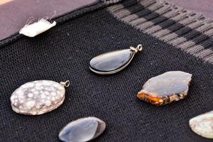 Various gemstones pendants photo